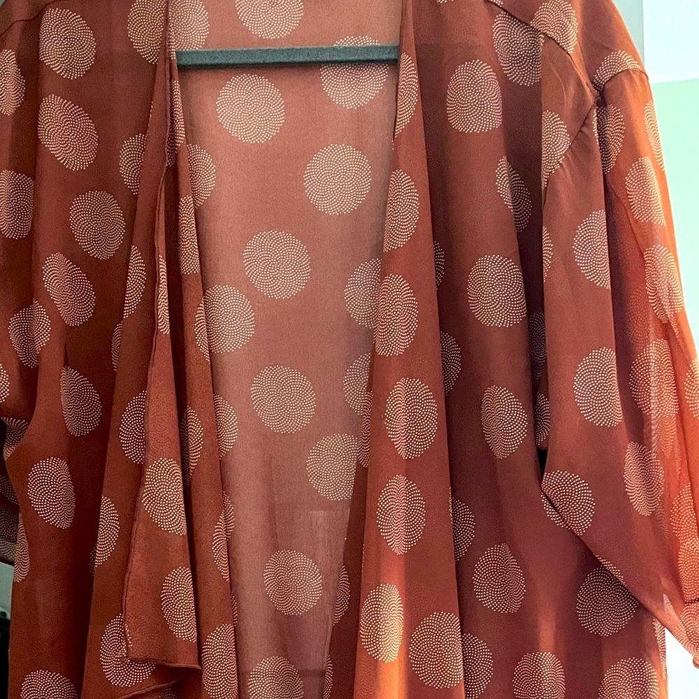 Lularoe Shirley rust brown with cream colored circle pattern. Size medium